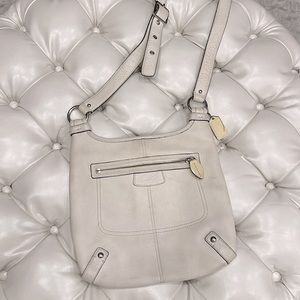 Cream colored Coach bag crossbody